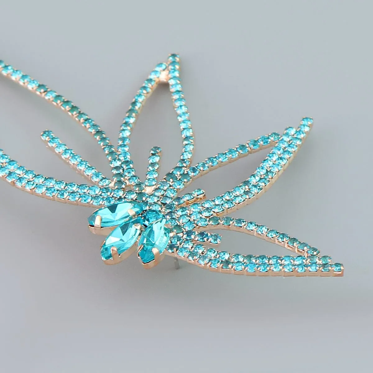 CRYSTAL FLOWER EARRINGS IN BLUE Gloria Lanvin