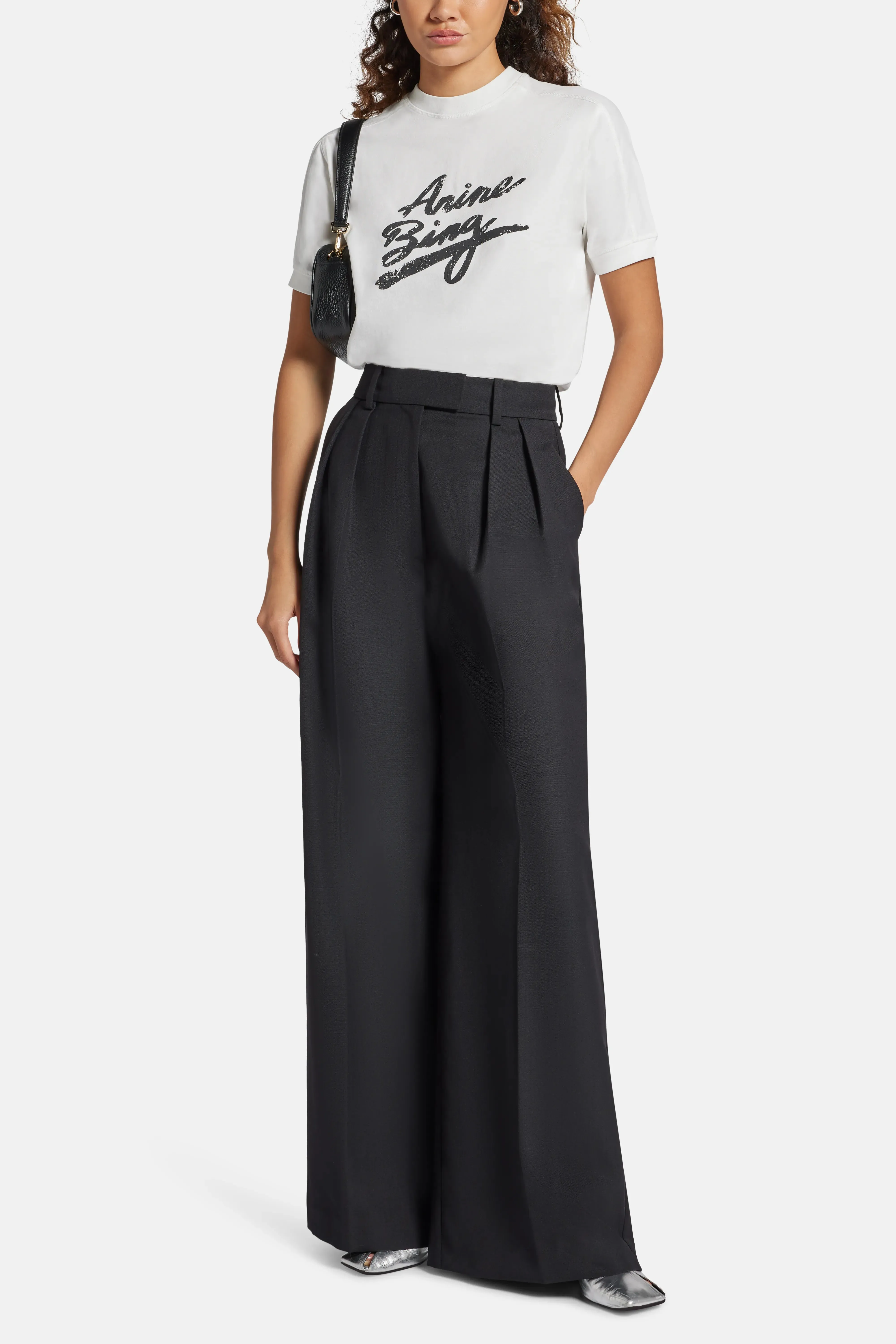 Lou High Waisted Flared Wool Trousers in Black