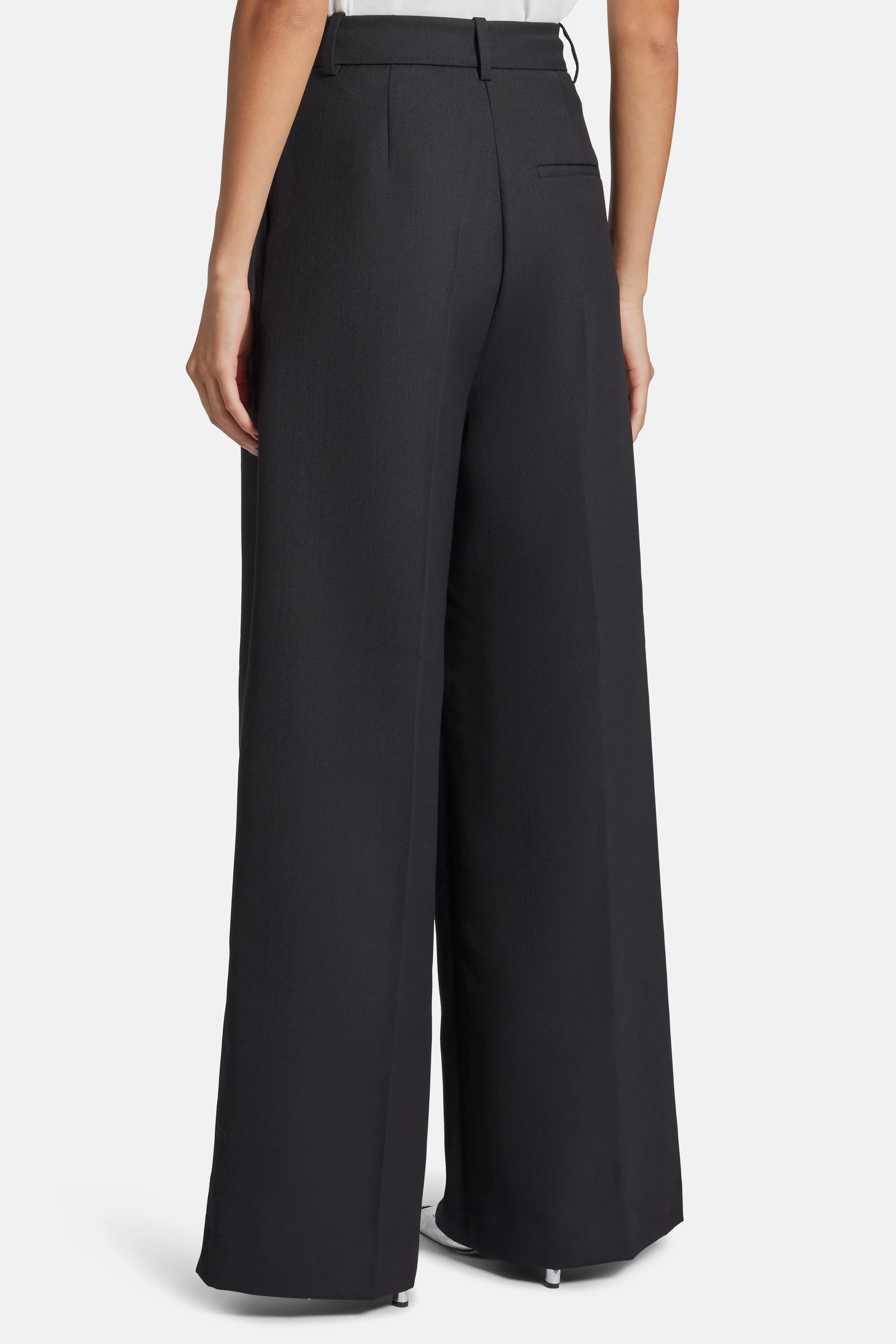 Lou High Waisted Flared Wool Trousers in Black