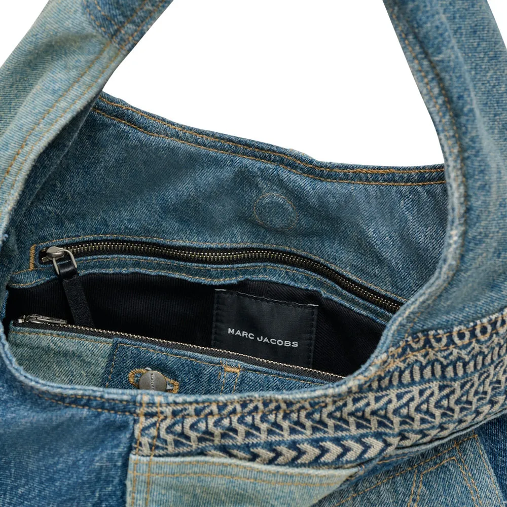 THE DECONSTRUCTED DENIM SACK BAG