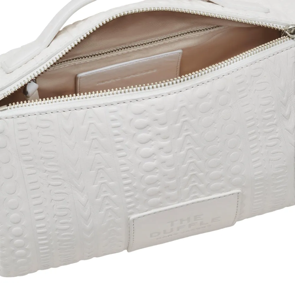 THE MONOGRAM DEBOSSED DUFFLE BAG