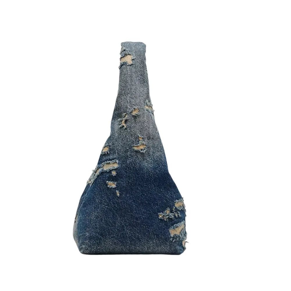 THE RIP AND REPAIR DENIM SACK BAG